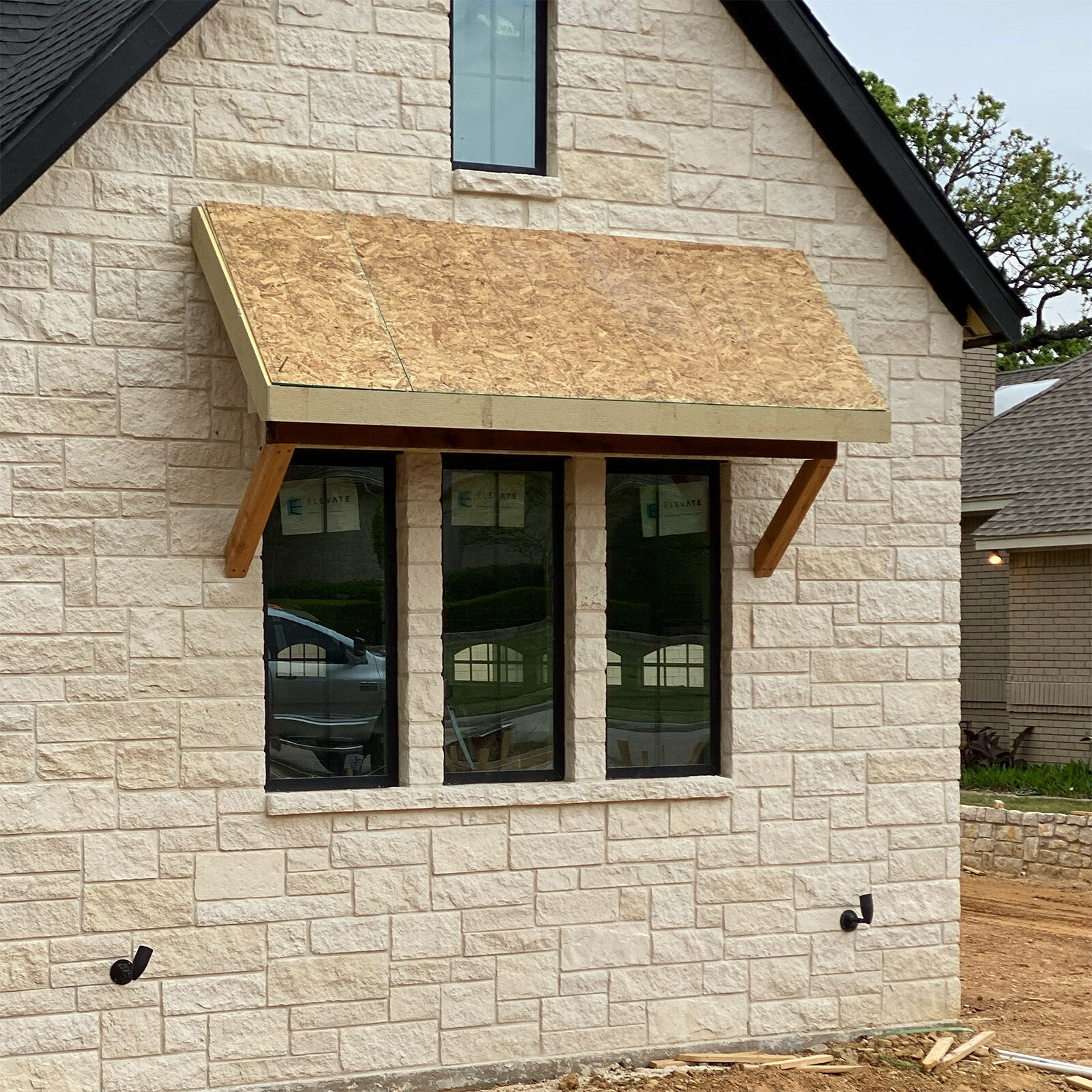 Newly built custom home with stone façade in the DFW metroplex