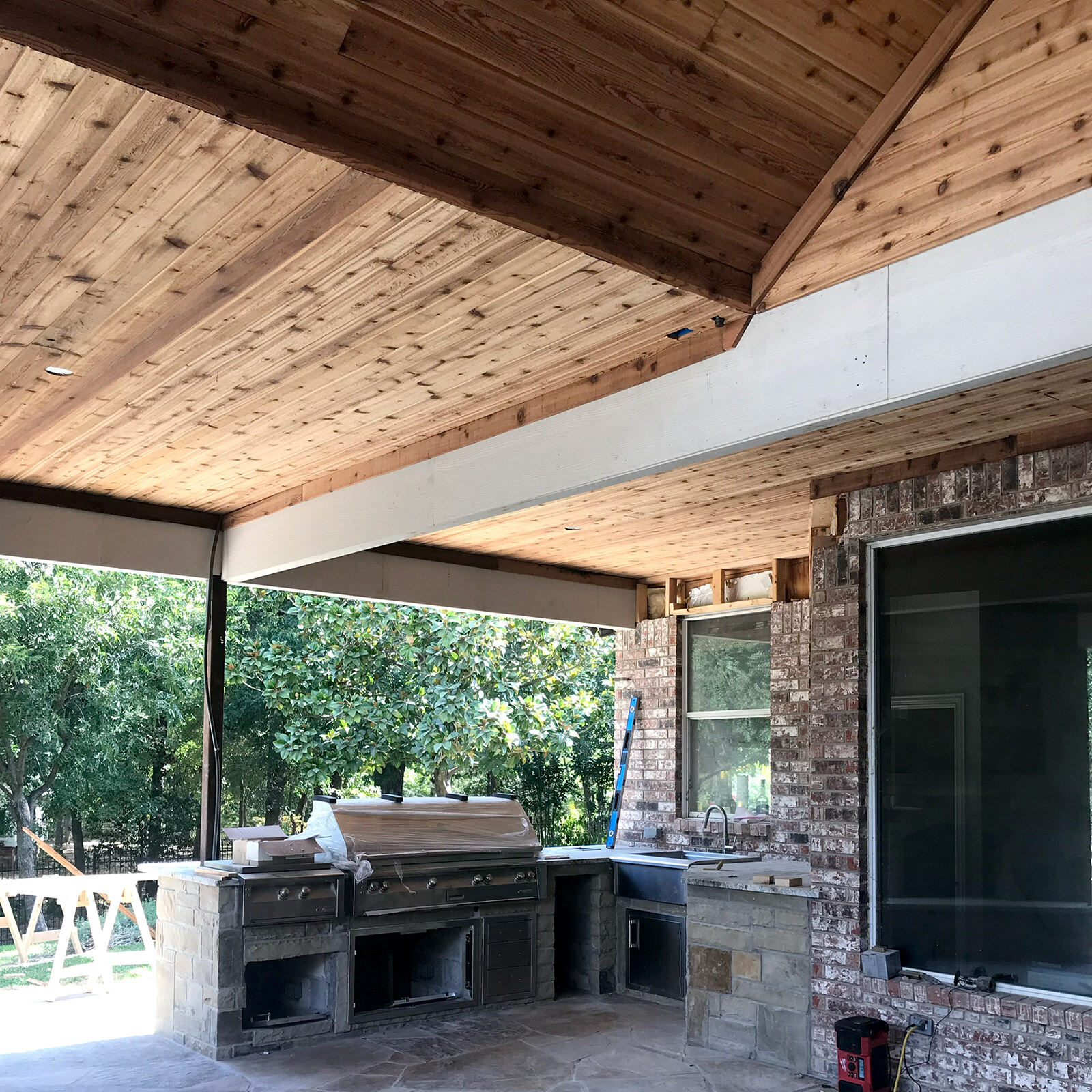 Outdoor kitchen with covered patio